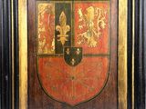 une image représentant une peinture d'un blason sur lequel figure un bouclier