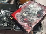 a box full of wires and wires sitting on the floor