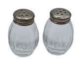 pair of glass salt and pepper shakers on white background