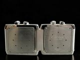 silver plated cuff watches with a black background and a black background