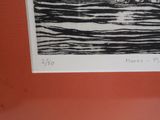 a black and white picture of a boat in the water