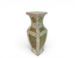 an image of a vase that is sitting on top of a table