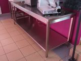a machine that is sitting on a table in a kitchen