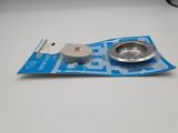 a small metal bowl and a plastic cup on a table