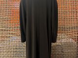 the back view of a black coat on a mannequin mannequin mannequin mannequin mannequin mannequin mannequin manne