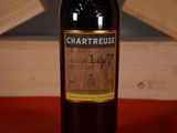 a bottle of wine that is sitting on a table