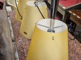 three lamps that are sitting on a counter top