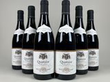six bottles of wine are lined up in a row