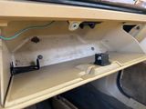 a picture of the inside of a car with the door open