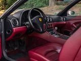 a car with red leather seats in the back of it