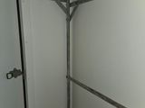 an image of a room with a door and a wall