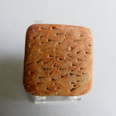 a piece of bread that is sitting on top of a piece of plastic