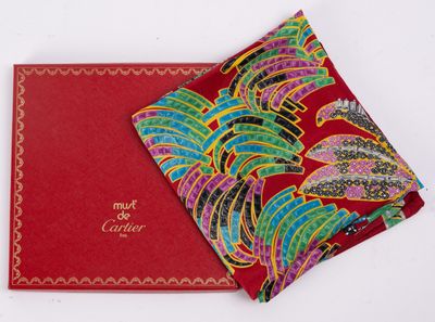 an image of a red box with a red and green paisley design on it