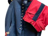 uniform of a soldier with a red jacket and blue jacket