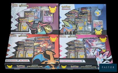 three different pokemon trading cards are on display in a display case