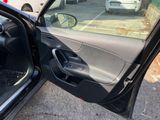 a car door open with the driver ' s side door open