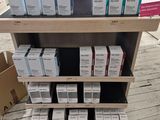 many boxes of skin care products on display in a store