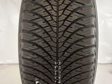 a close up of a tire on a white surface