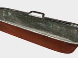 an old metal tub with a handle on a white background