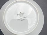 a white plate that has a black and white label on it