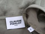 a label that says claudia pierlot on the back of a jacket