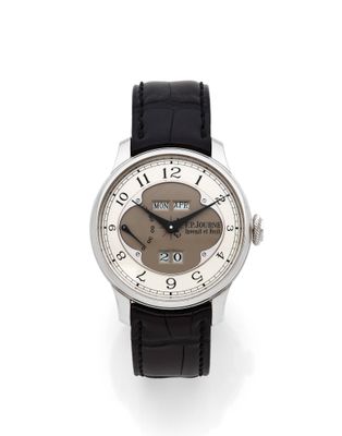 une photo d'une montre-bracelet argentée avec un bracelet en cuir noir