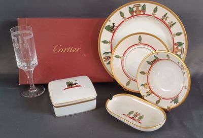 an image of a table setting with a red box and a wine glass