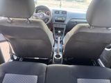 two black seats in the back of a car