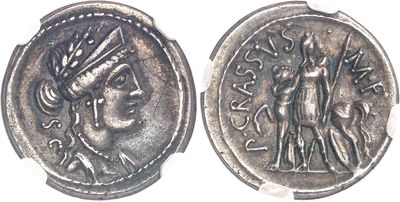 a close up of a coin with an image of a woman on it