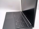 a laptop that is sitting on a white table