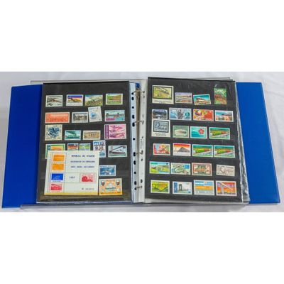 a blue binder with stamps and stamps on it