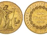 une pièce d'or sur laquelle figurent un homme et un oiseau