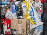 many different types of fishing lures in a bin