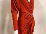 a mannequin wearing an orange dress on a white mannequin mannequin mannequin mann