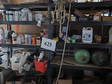 a lot of stuff on the shelves in the room