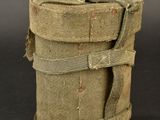 an image of a roll of cloth with a strap around it
