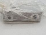 a plastic bag with a remote control inside of it