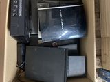 a box that has a television and other electronics inside of it