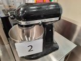 an image of a stand mixer on display in a store