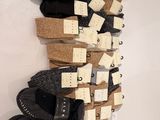 many pairs of socks hanging on the wall