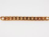 a gold chain bracelet on a white background
