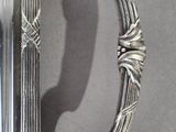 a close up of a mirror with a handle on it