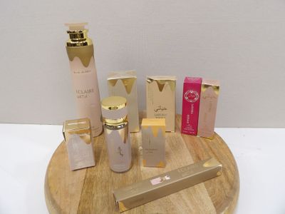 a wooden tray with a lot of beauty products on it
