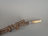 a wooden stick with a stick sticking out of it