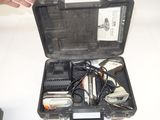 a black case with tools in it sitting on a table