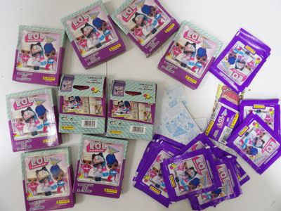 a lot of purple and white items on a table