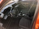 the interior of a car with the sun shining through the window