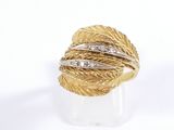an image of a close up of a ring on a white surface