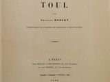 un vieux livre avec un titre en noir et blanc