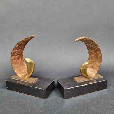 pair of art deco bookends in the form of crescents
